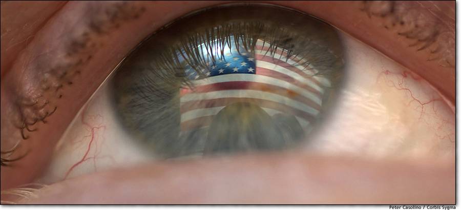 An American flag is reflected Oct. 10, 2001 in the eye of a resident of New Haven, Conn., amid a surge of patriotism generated by terror attacks on the United States.