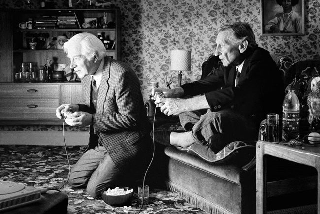 Old men playing modern video game.