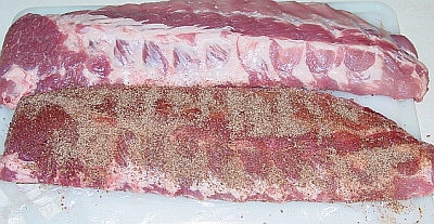 Rub being used on baby back pork ribs