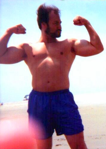 Me clowning around at the beach back in the 90s